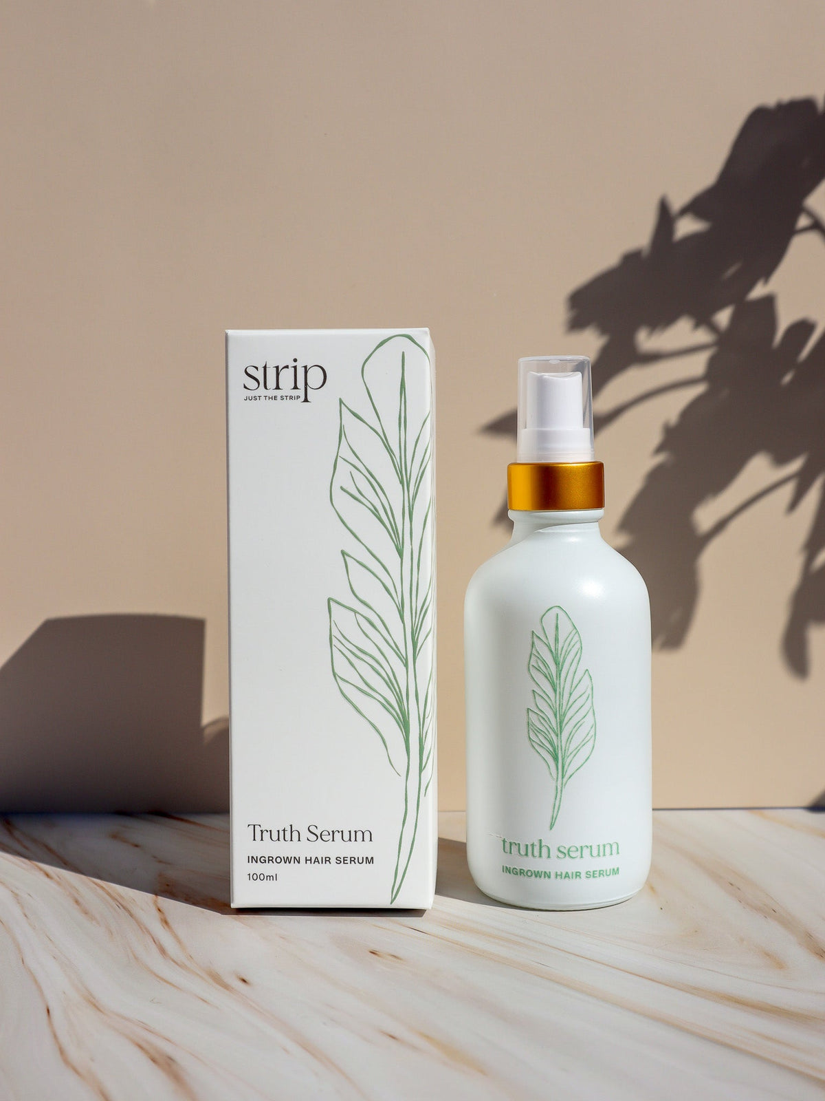 Truth Serum acid free ingrown hair serum beside its box, for choosing between Smooth Operator or Truth Serum